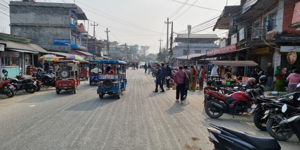 Digitalisation and Decentralisation of Nepal's Land Administration Sector. Image show s a busy urban street in Nepal.