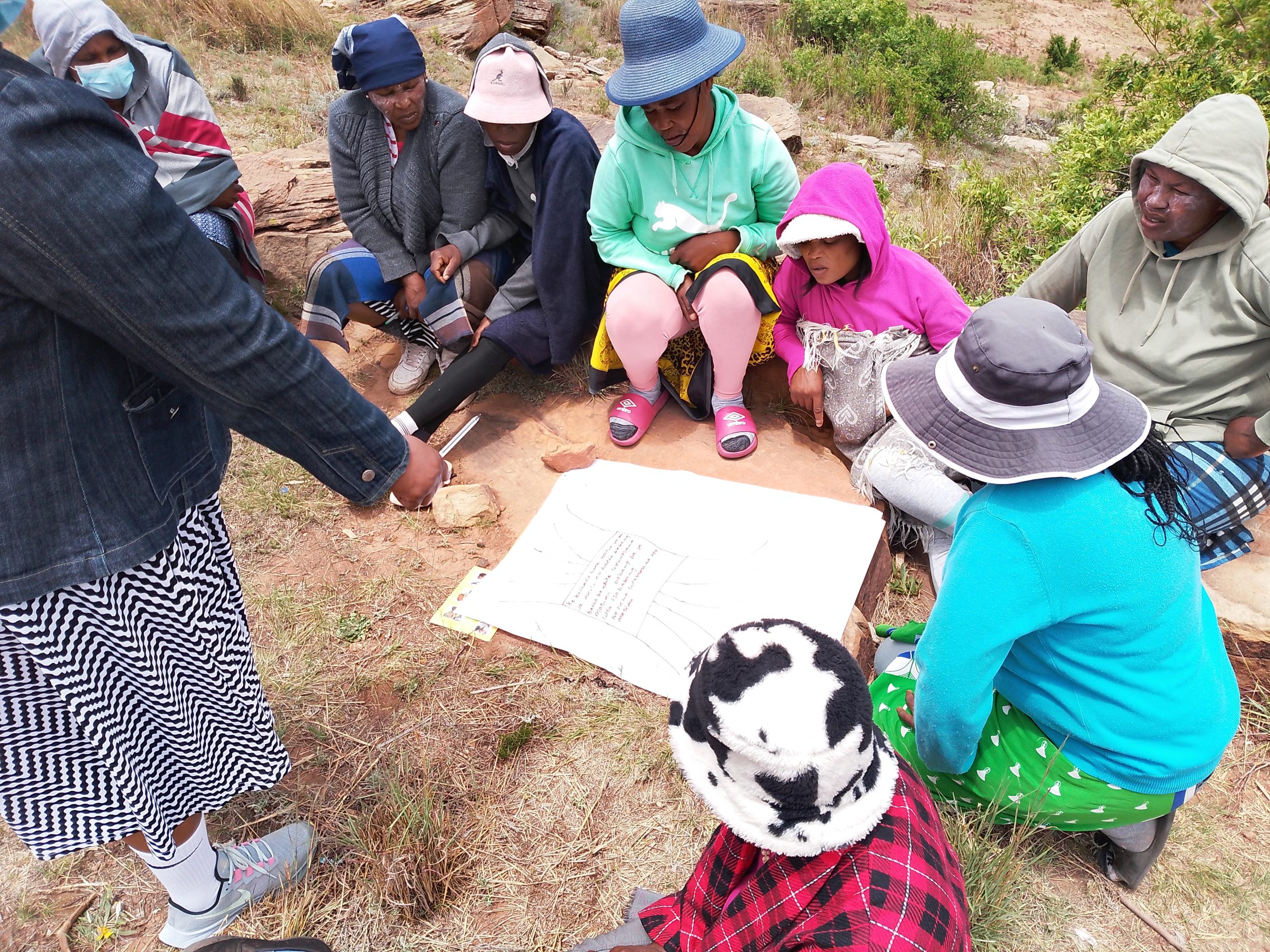 Separate groups; women discussing their specific land challenges in the MDIH Land & Gender Community Dialogues in Phamong.